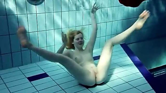 Blonde swims and loses all her clothing