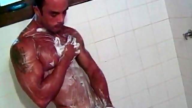 Soapy solo Latin guy masturbates in the shower